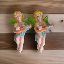 Engel Putten Musiker aus Gips