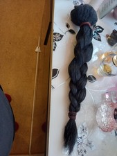 echtes Haar, 50 cm lang, schwarz. Kann gelockt und geglättet werden 100 Euro