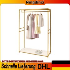 Goldene Metall-Kleidung