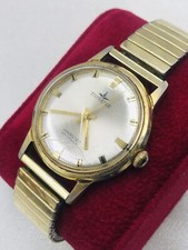 Vintage DUGENA Jongster Herrenuhr HANDAUFZUG  Funktioniert Flexarmband 