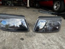 Schwarze Scheinwerfer  rechts links  VW Passat 3B 96-00 3bg