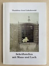 Schriftstellen mit Maus und