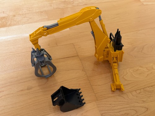 Bruder heckbagger mit greifer - heckbagger,
