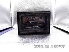 Charles Delon, Brille und Uhr