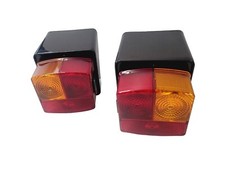 DEUTZ Rückleuchten HELLA Satz + Halter für Serie 06 07 DX3 DX4 Intrac Traktor