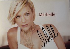 Michelle signiert Karte