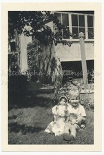 Little Boy with Doll in Summer