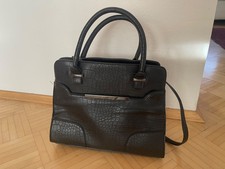 Schwarze elegante Handtasche