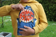 Gelber Hoodie von C&A mit Dino-Motiv (Größe 110, 5 Jahre) Topzustand