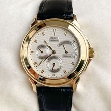 Corum Reserve De Marche 18k Gold 35mm 73.111.56 Herrenuhr 2000er Power Reserve