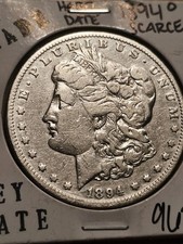 One Morgan Silver Dollar DATE