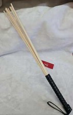 8 Rattanstöcke mit schwarzem
