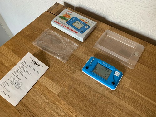 Tandy plane tank battle - tandy, lcd