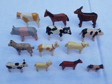 13 Holztiere Kühe Pferde