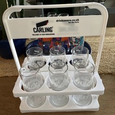 Carling Homeground Six-Pint Glasträger mit Gläsern
