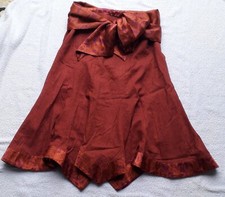 ST-MARTINS Rock Gr. S  Orange lila mit Schleife, zipfelig