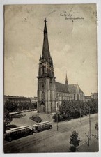 AK Karlsruhe, Kath. Bernhardus-Kirche, Ansichtskarte 1913 Straßenbahn