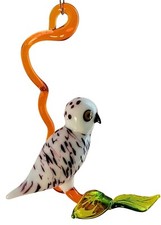 Hängevogel Schneeeule auf Ast