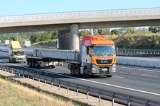 LKW Foto MAN TGS Plattformanhänger Deutschland orange Universal Transport #l2ba