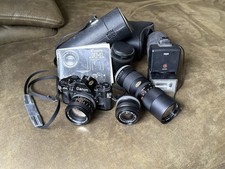 Canon A-1 Spiegelreflexkamera mit umfangreichem Zubehör – Klassiker für Sammler