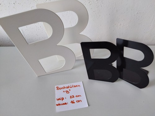 Paar dekorative buchstützen - 2,