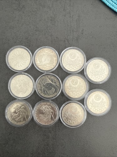 11x silbermünzen - 11x,