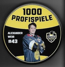 Eishockey Puck  KREFELD PINGUINE 1000 SPIELE ALEX WEIß       DEL NHL
