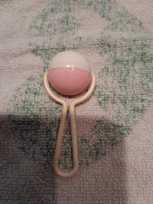 1 Stück  Ari Puppenrassel Rosa Weiß. originales und verschiedenes- ARI-Püppchen.