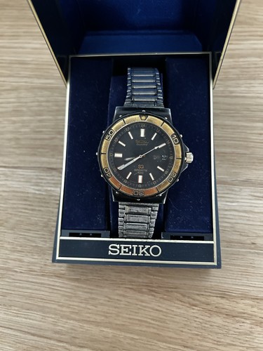 Seiko quartz sports 100 - sq,