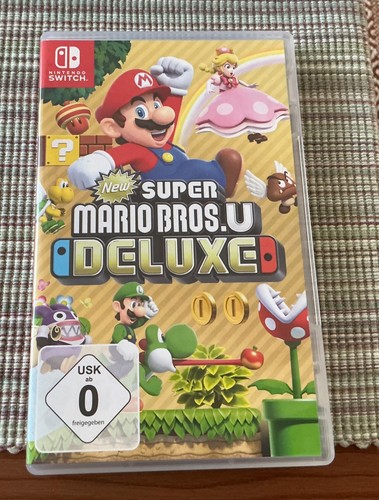 New super mario bros deluxe - super,