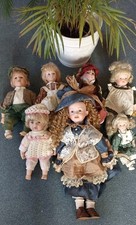 7 Puppen aus Porzellan Keramik