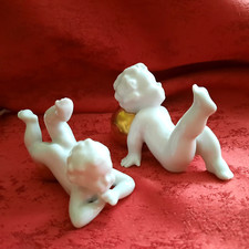 2x Sammler-Putten mit