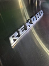 + Rekord + Emblem Metall