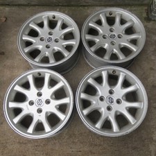 4 Suzuki Alufelgen von Borbet 7x15" ET35 KBA 44091 4x100 CK70535