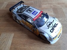 TAMIYA Opel Calibra in perlmutt weiß mit Fahrerfigur, nie gefahren.