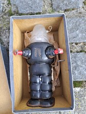 SCHWARZER BLECH UHRWERK ROBOTER PLANET ROBOT MIT FEUERSTEIN BLECH LITHO (F2)