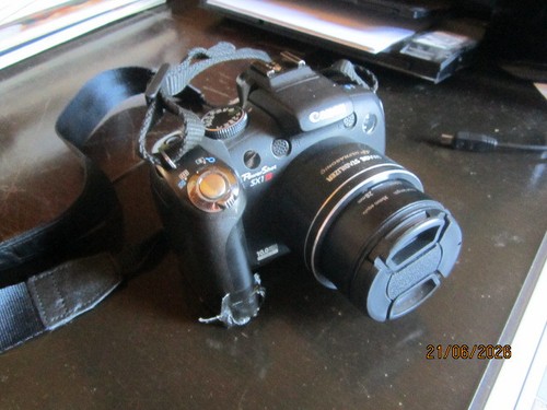 Canon powershot sx1 0mp - canon,