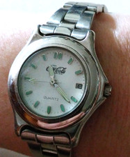 Damenuhr Coca Cola , Datum, Sekunden-/ Leuchtzeiger, Leuchtindizes,Edelstahlband