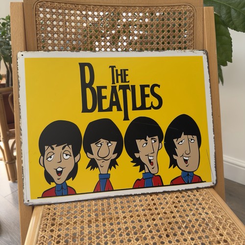 The beatles cartoon schild - the,