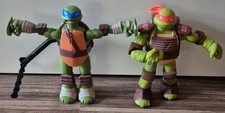 TM NinjaTurtle Actionfiguren Michelangelo 2012 & SuperSidewindin Leonardo 2014