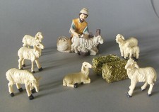 Schafscherer sitzend +6 Schafe