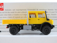 Busch 51080 Mercedes-Benz Unimog U 5023 DoKa Pritsche (2013) in gelb 1:87/H0