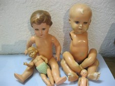 4 alte defekte Puppen von