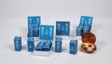 Display mit 6 - *~, schachteln