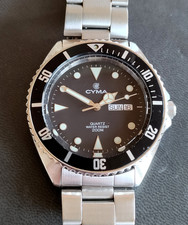 Cyma diver Ref. 9111, daydate, Quartz ETA 955.422, 40mm, swiss made,  19cm wrist