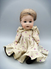 Armand Marseille Puppe 25 cm hoch Porzellankopf Modell 990