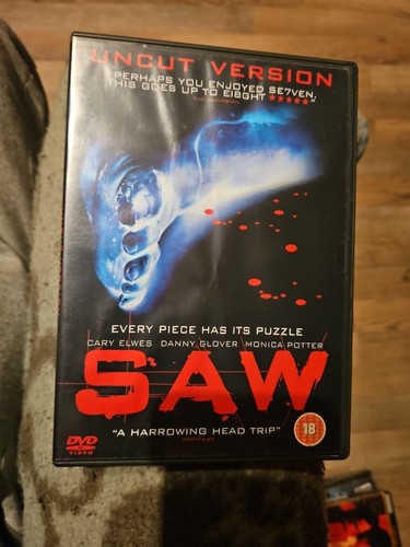 Dvd saw uncut version - saw,