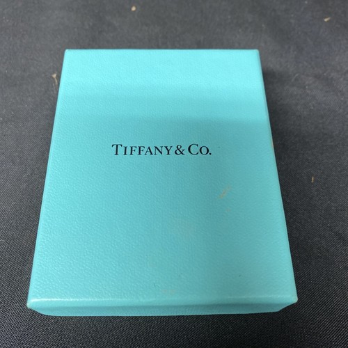 Tiffany please return to - &,