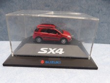 28137. Suzuki SX4  rotbraun  Modell  Rietze