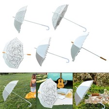 Weißer Spitzenregenschirm